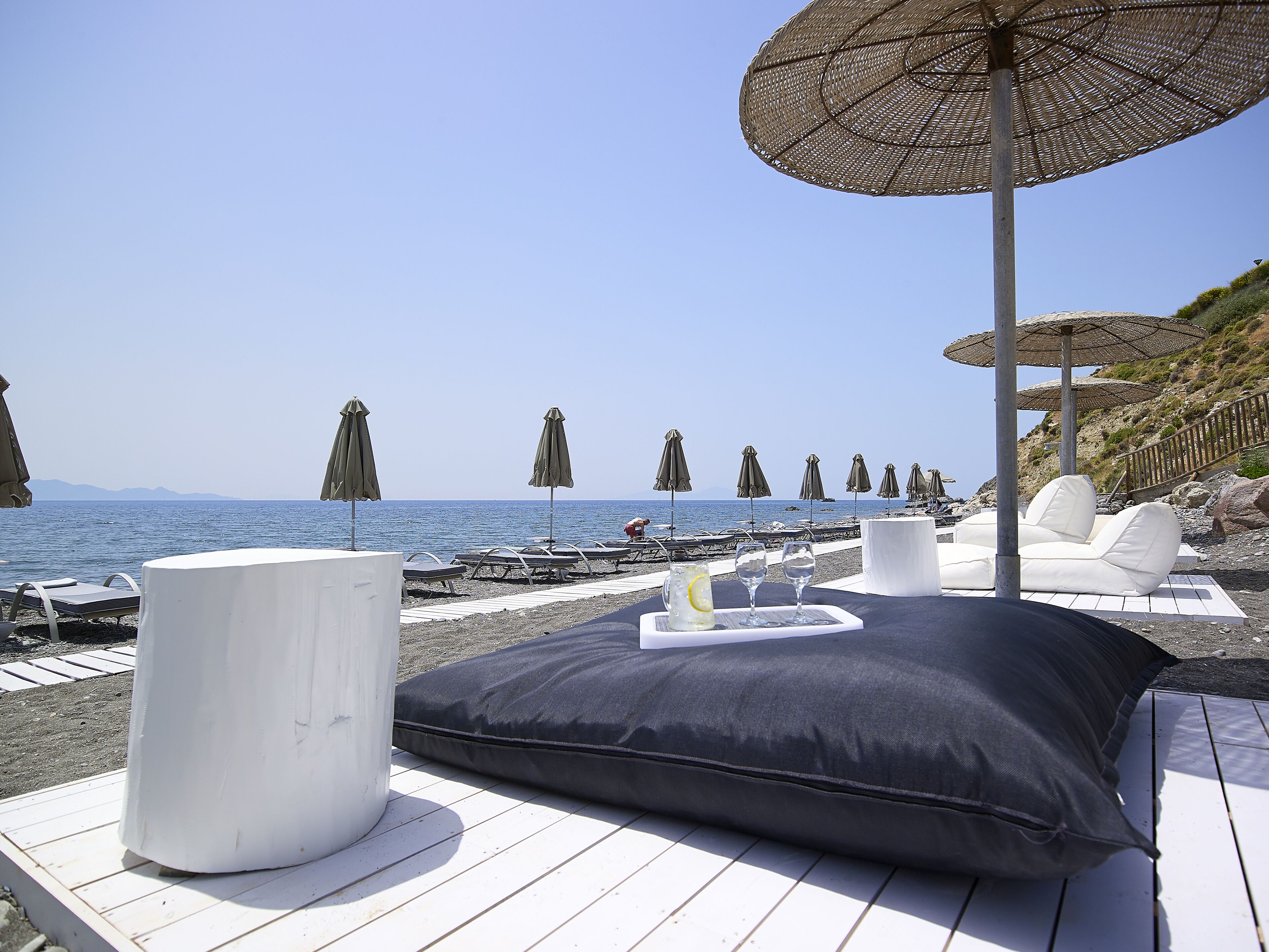 private beach, sun-loungers, beach umbrellas, beach towels