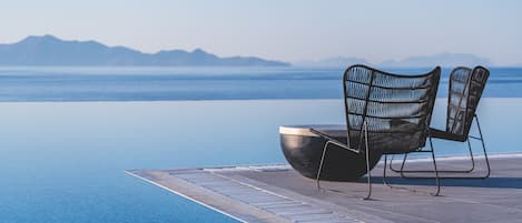 Indoor pool, 3 outdoor pools, open 10:00 AM to 6:00 PM, pool umbrellas