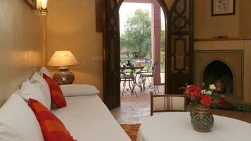 Villa, 2 Bedrooms, Private Pool, Garden View | Living area | Fireplace, smart speakers