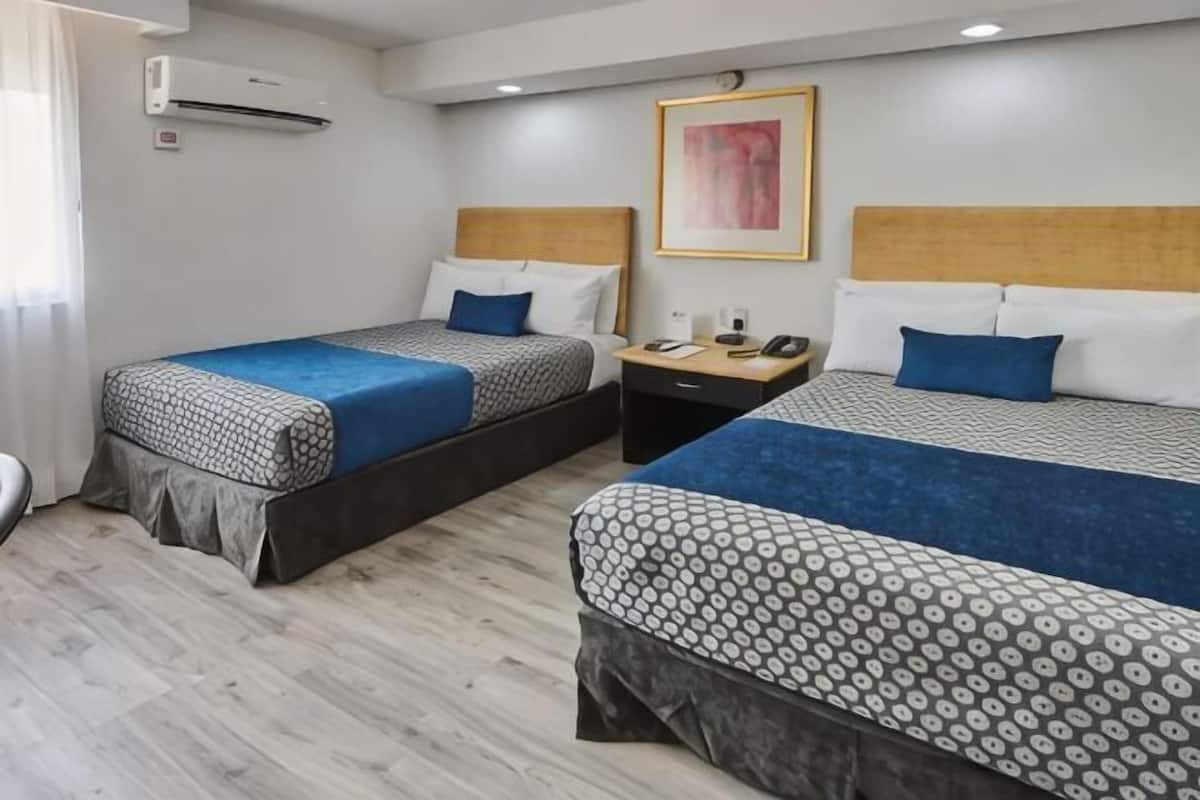 Premium bedding, in-room safe, individually decorated