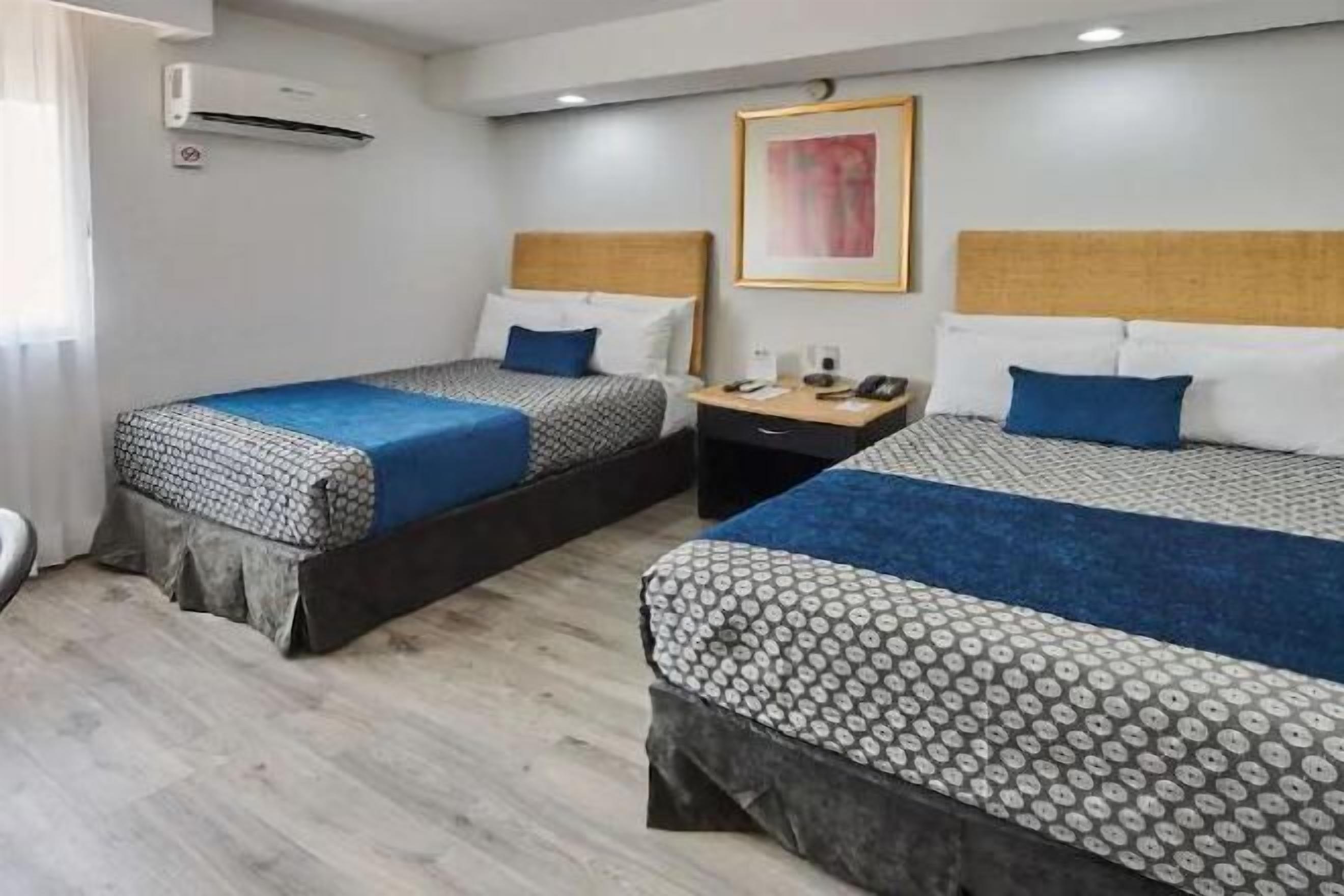 Premium bedding, in-room safe, individually decorated