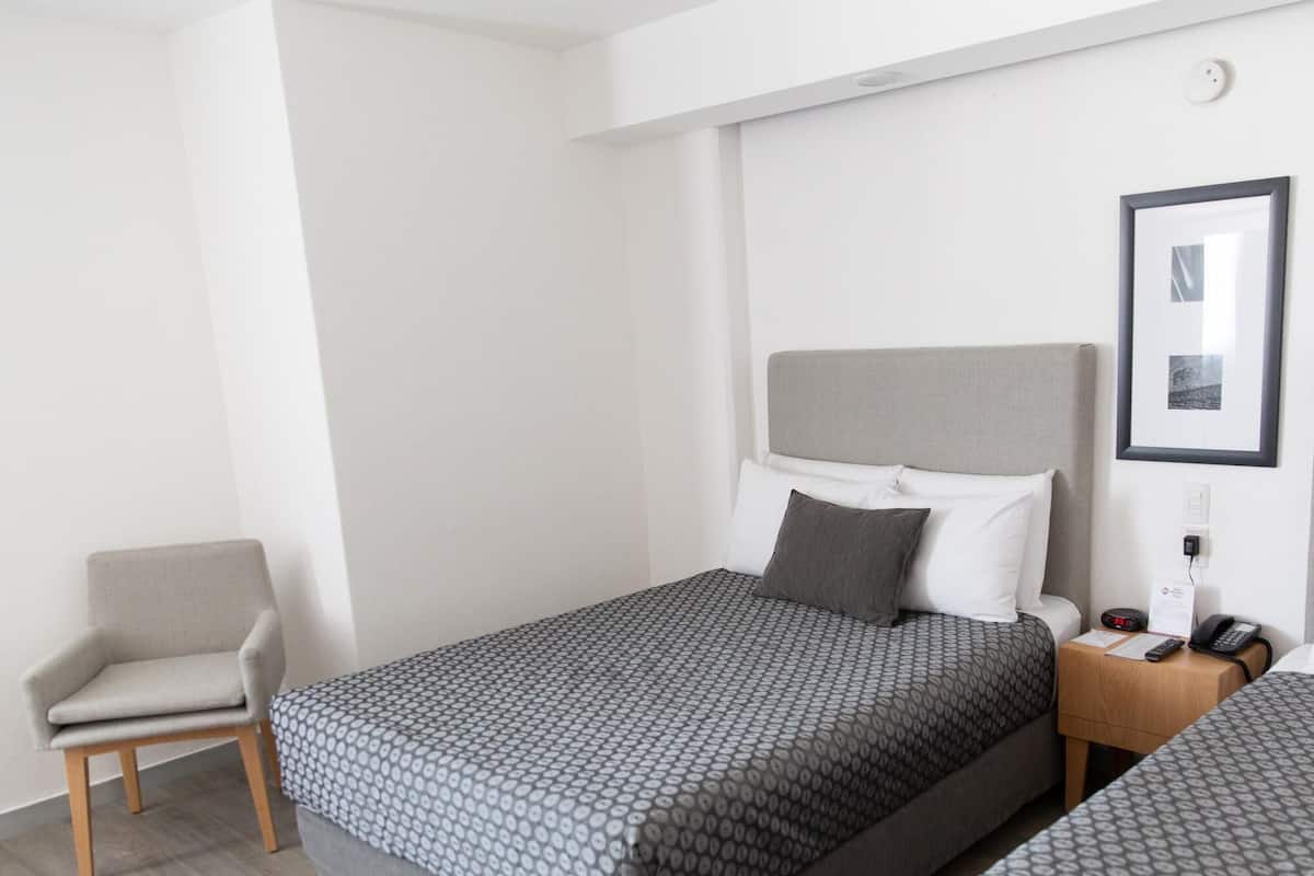 Premium bedding, in-room safe, individually decorated