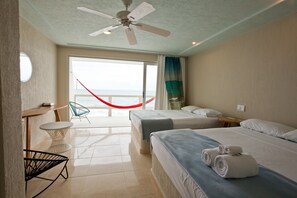 Double Room, Ocean View | Minibar, in-room safe, individually decorated, individually furnished