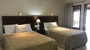 Classic Ocean Front | Minibar, in-room safe, individually decorated, individually furnished