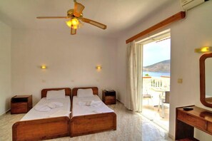 Habitación doble | Minibar, caja fuerte, tabla de planchar con plancha y cunas gratuitas