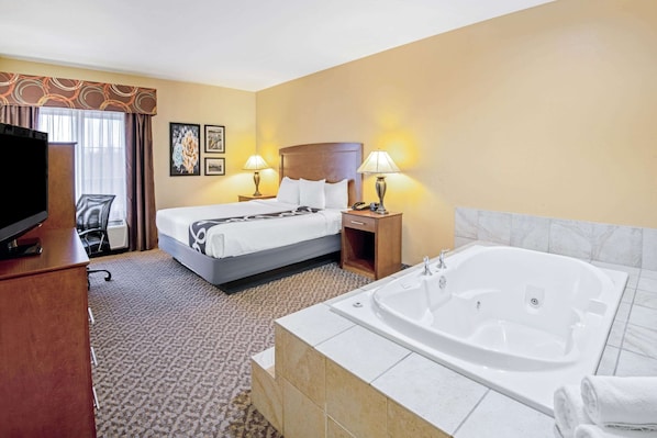 Deluxe Suite, 1 King Bed, Non Smoking | Premium bedding, desk, blackout drapes, iron/ironing board