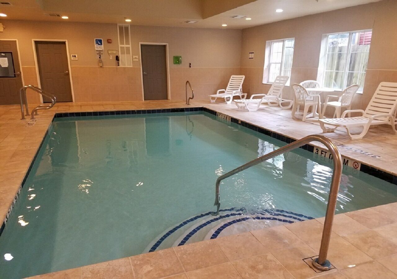 indoor pool, open 9:00 am to 10:00 pm, pool loungers