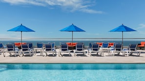 Seasonal outdoor pool, open 9:00 AM to 7 PM, pool loungers