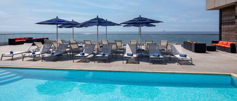 Seasonal outdoor pool, open 9:00 AM to 7 PM, sun loungers
