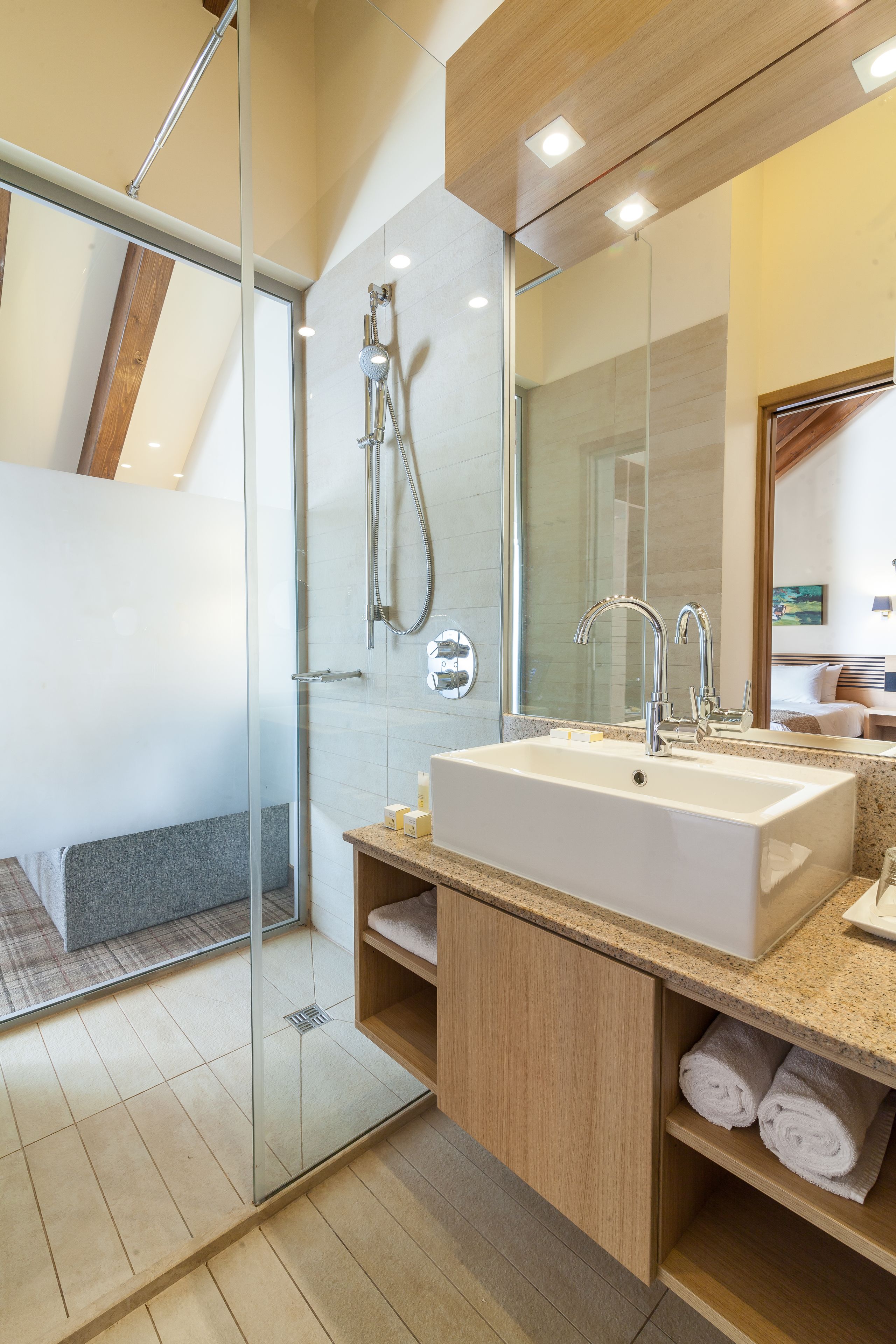 shower, free toiletries, bathrobes, slippers