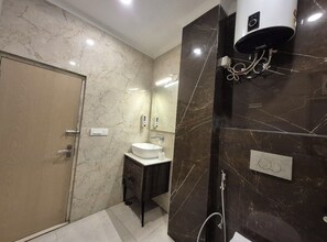 Shower, rainfall showerhead, designer toiletries, towels
