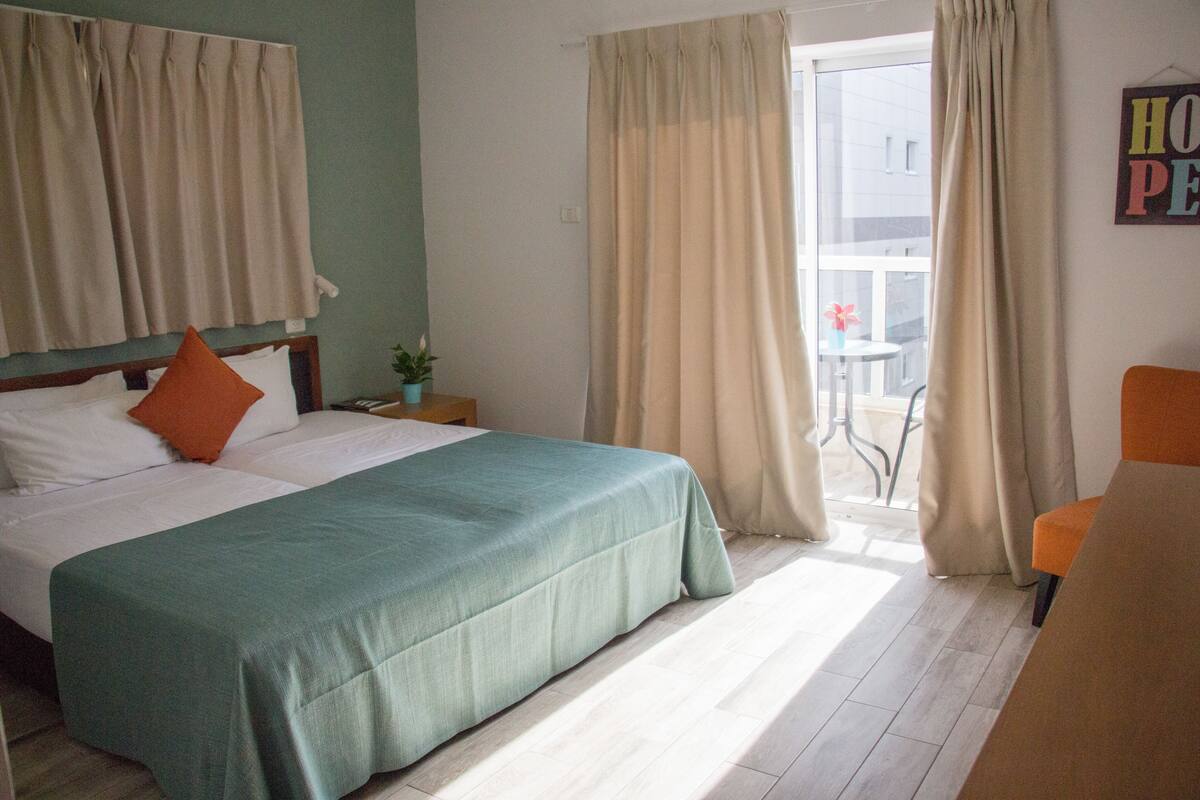 Superior Room, Partial Sea View | Living room | LED TV