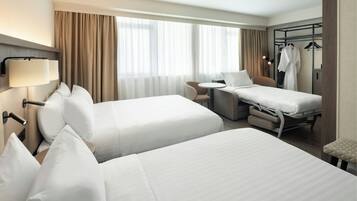Room, 2 Double Beds | In-room safe, desk, iron/ironing board, free cots/infant beds
