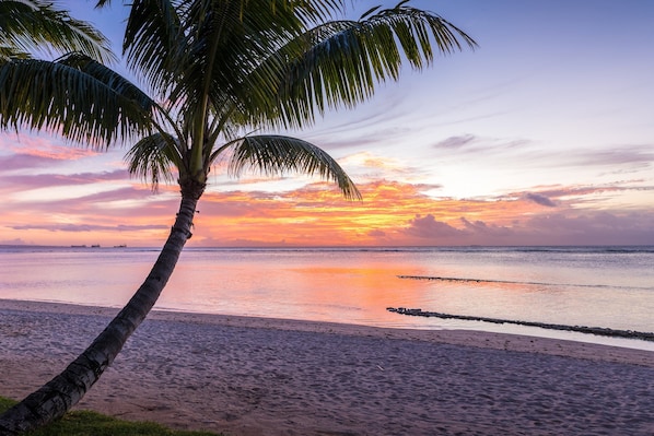 Private beach, white sand, sun loungers, beach umbrellas