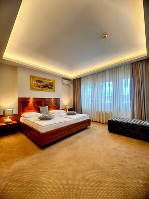 Down comforters, minibar, in-room safe, blackout drapes