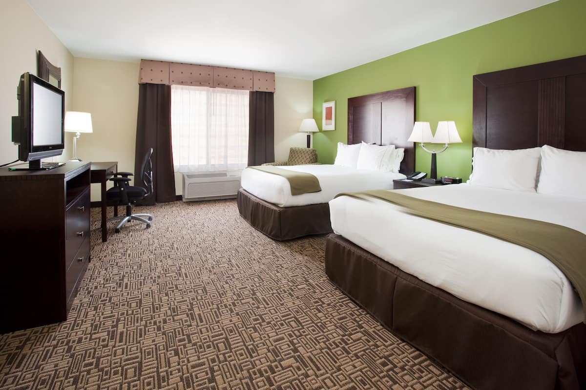 Pillow-top beds, desk, blackout curtains, iron/ironing board