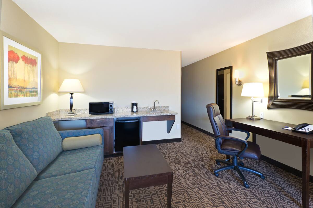 Pillow-top beds, desk, blackout curtains, iron/ironing board