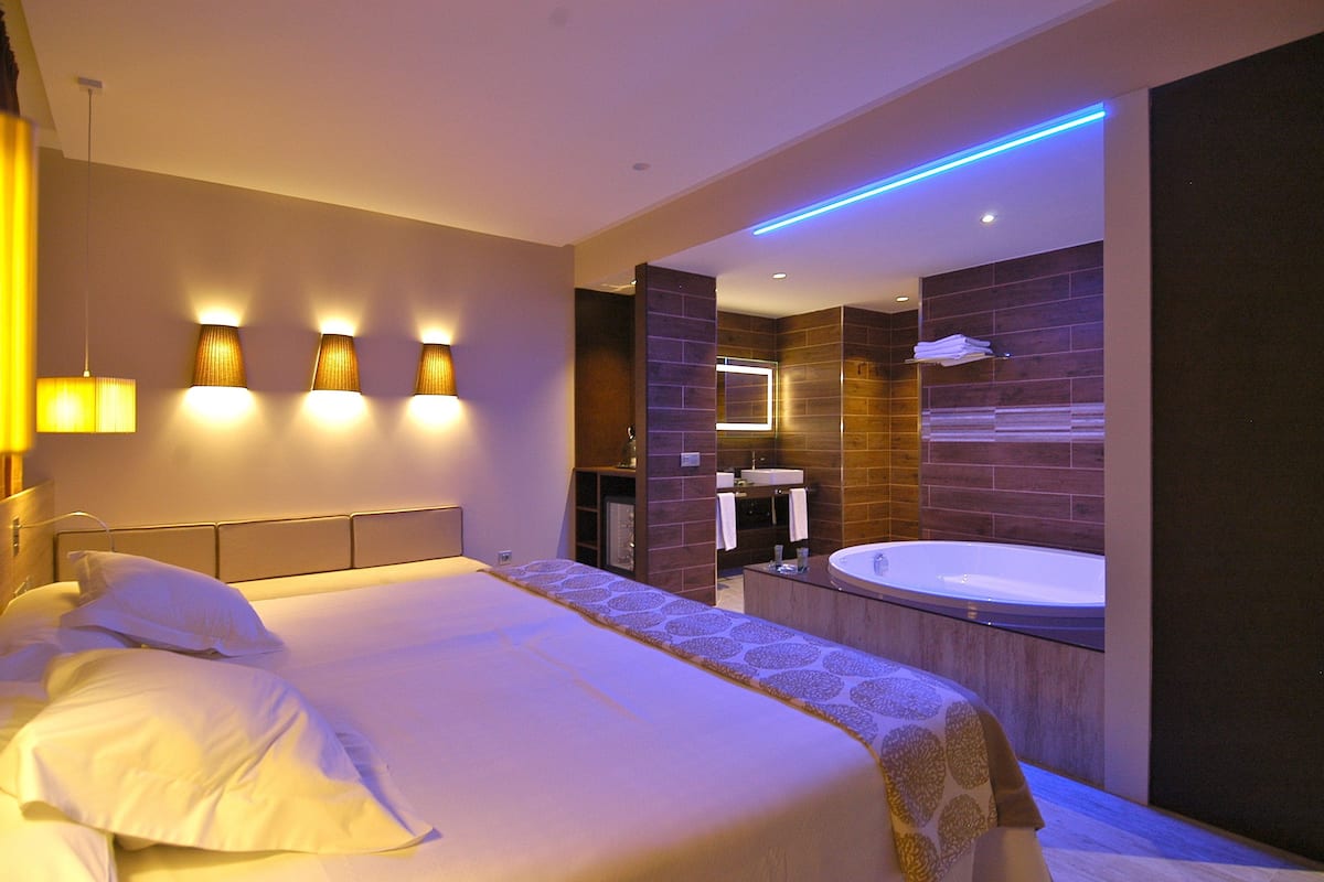 Select Comfort beds, minibar, in-room safe, desk