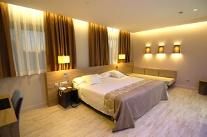 Select Comfort beds, minibar, in-room safe, desk