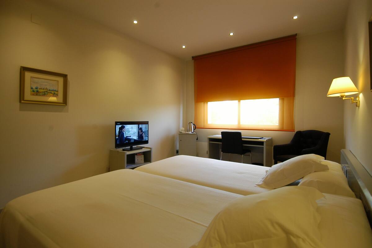 Select Comfort beds, minibar, in-room safe, desk
