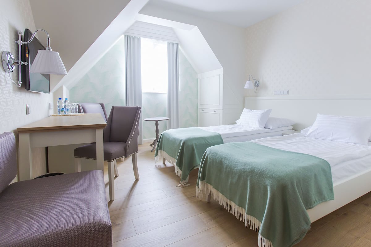 Seprai premium, minibar, Wi-Fi gratis, dan seprai linen
