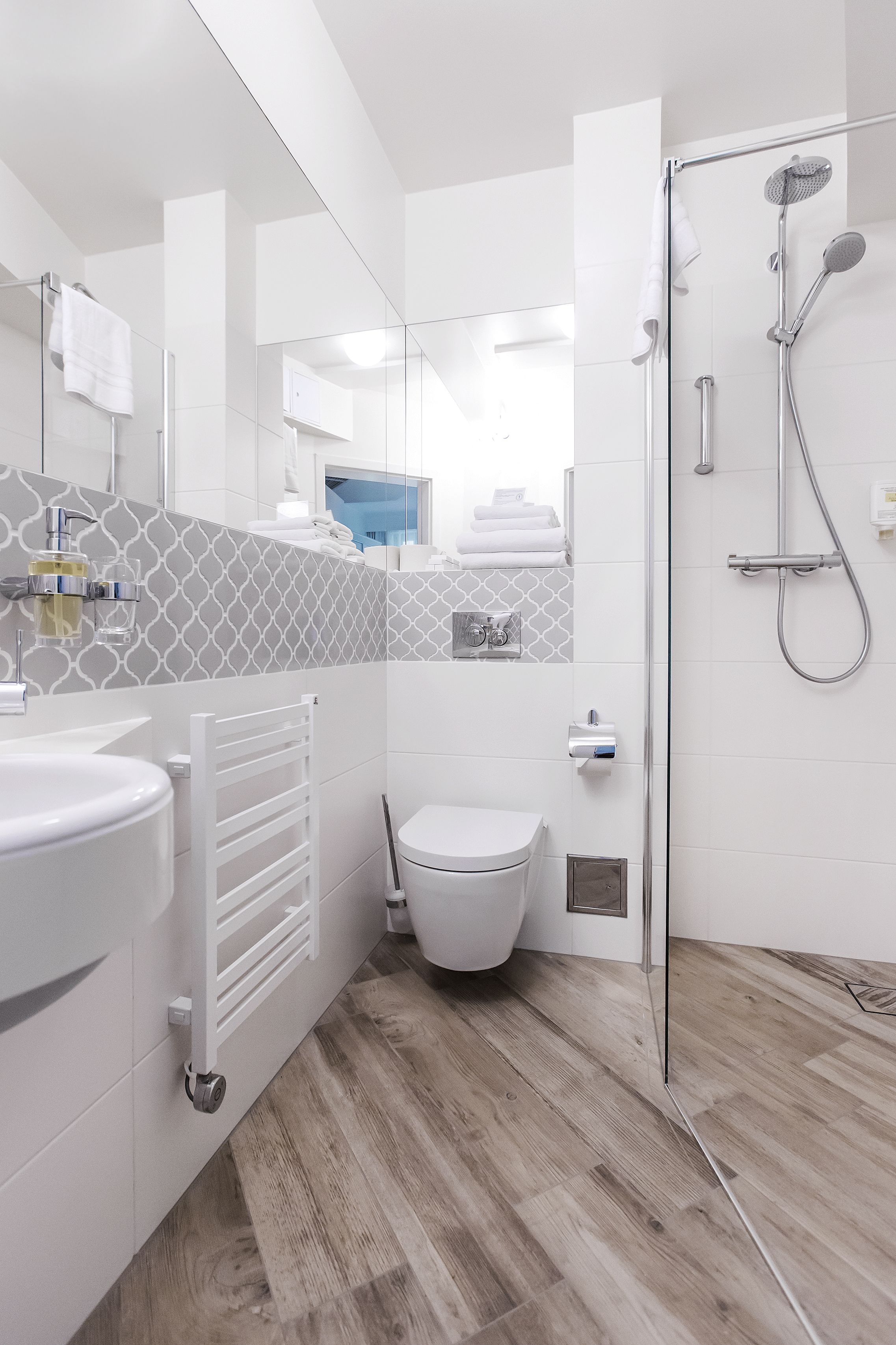 deluxe double room | bathroom | hair dryer, towels