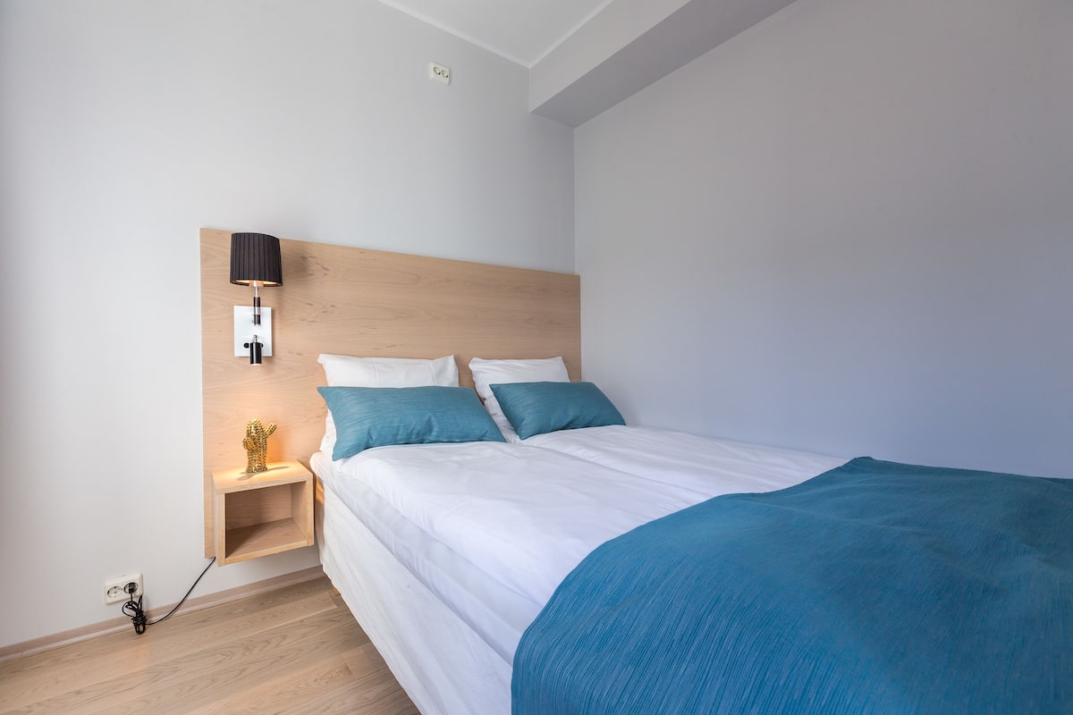 Apartment, 1 Bedroom, City View | 1 bedroom, in-room safe, soundproofing, iron/ironing board