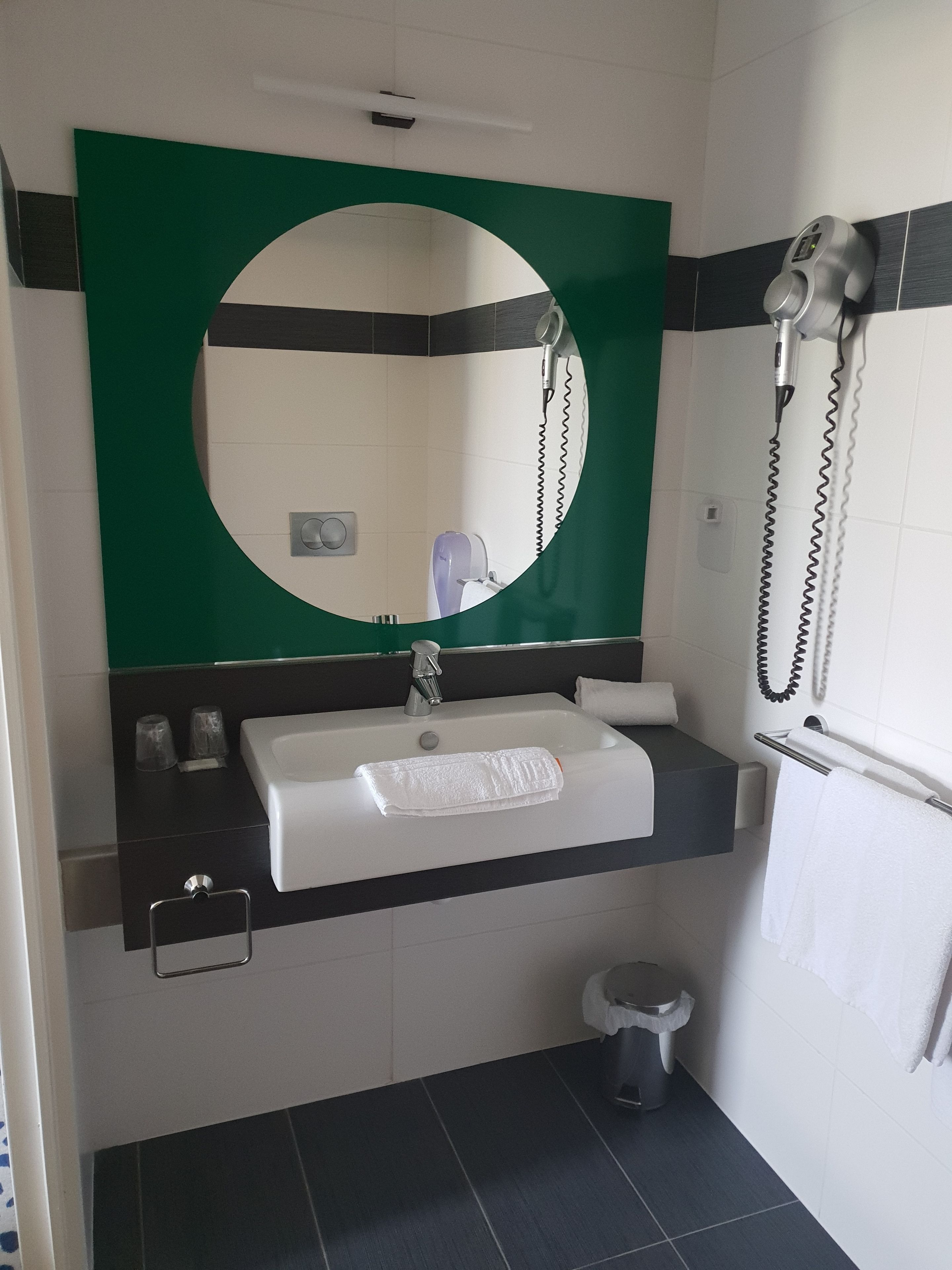 eco-friendly toiletries, hair dryer, towels