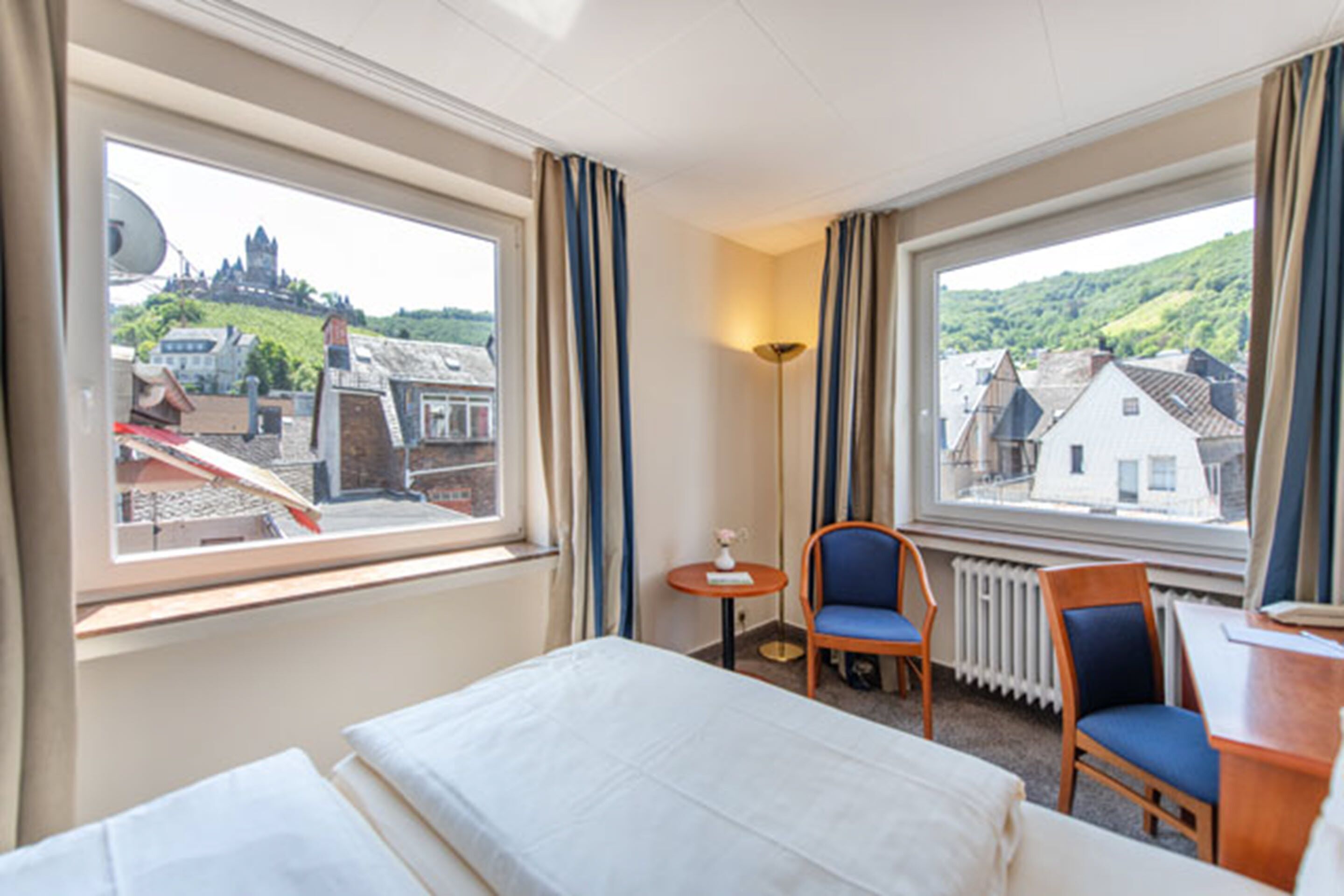 double or twin room, city view | living area | 100-cm led tv with cable channels, tv