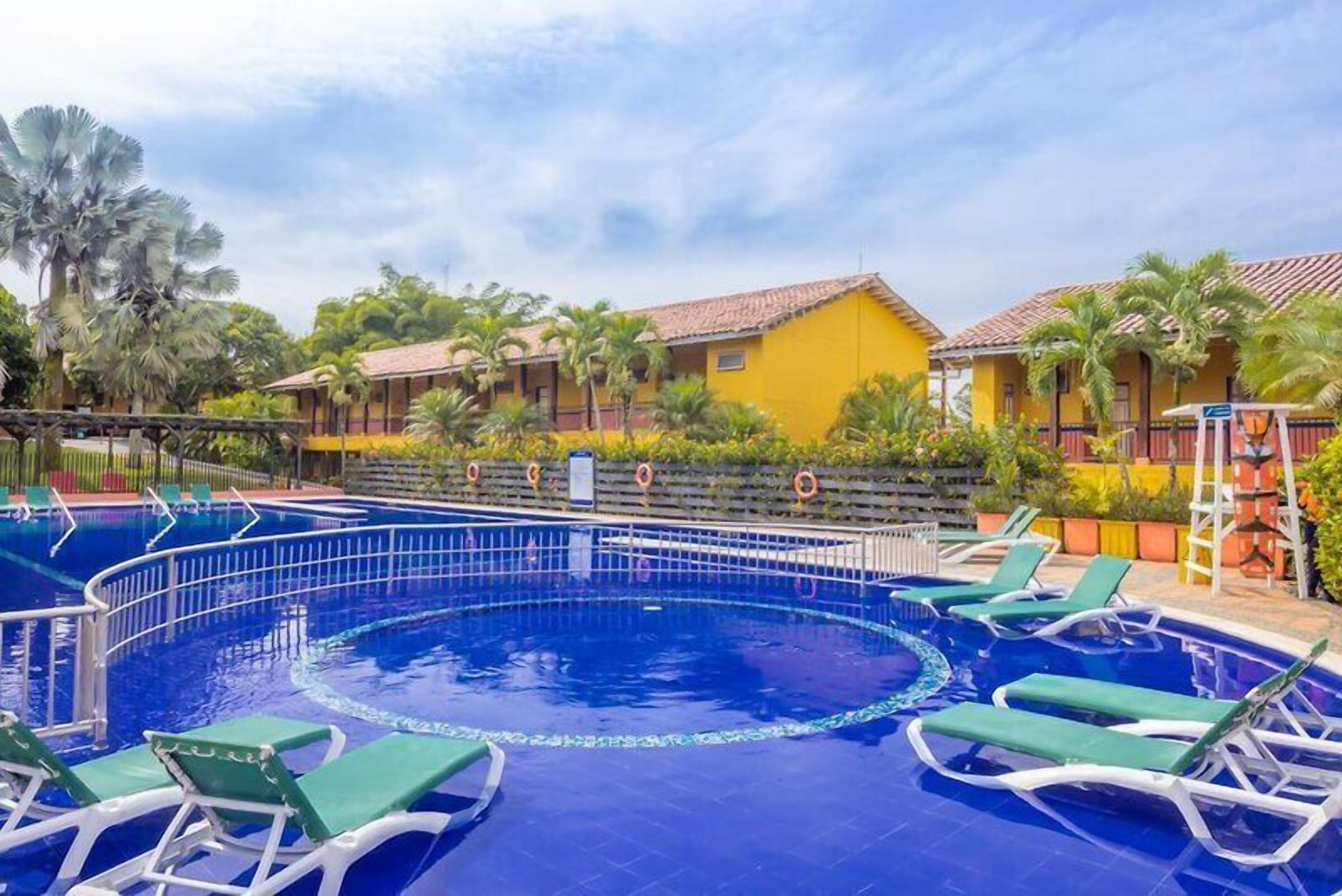 3 outdoor pools, pool umbrellas, sun loungers