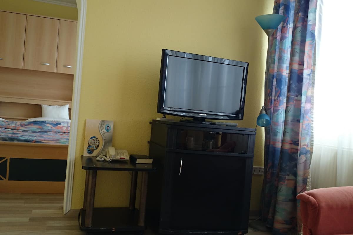 Appartamento, 1 camera da letto | Minibar, una cassaforte in camera, tende oscuranti