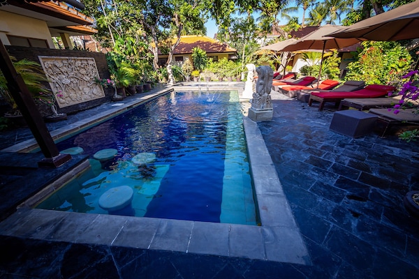 Outdoor pool, pool umbrellas, sun loungers