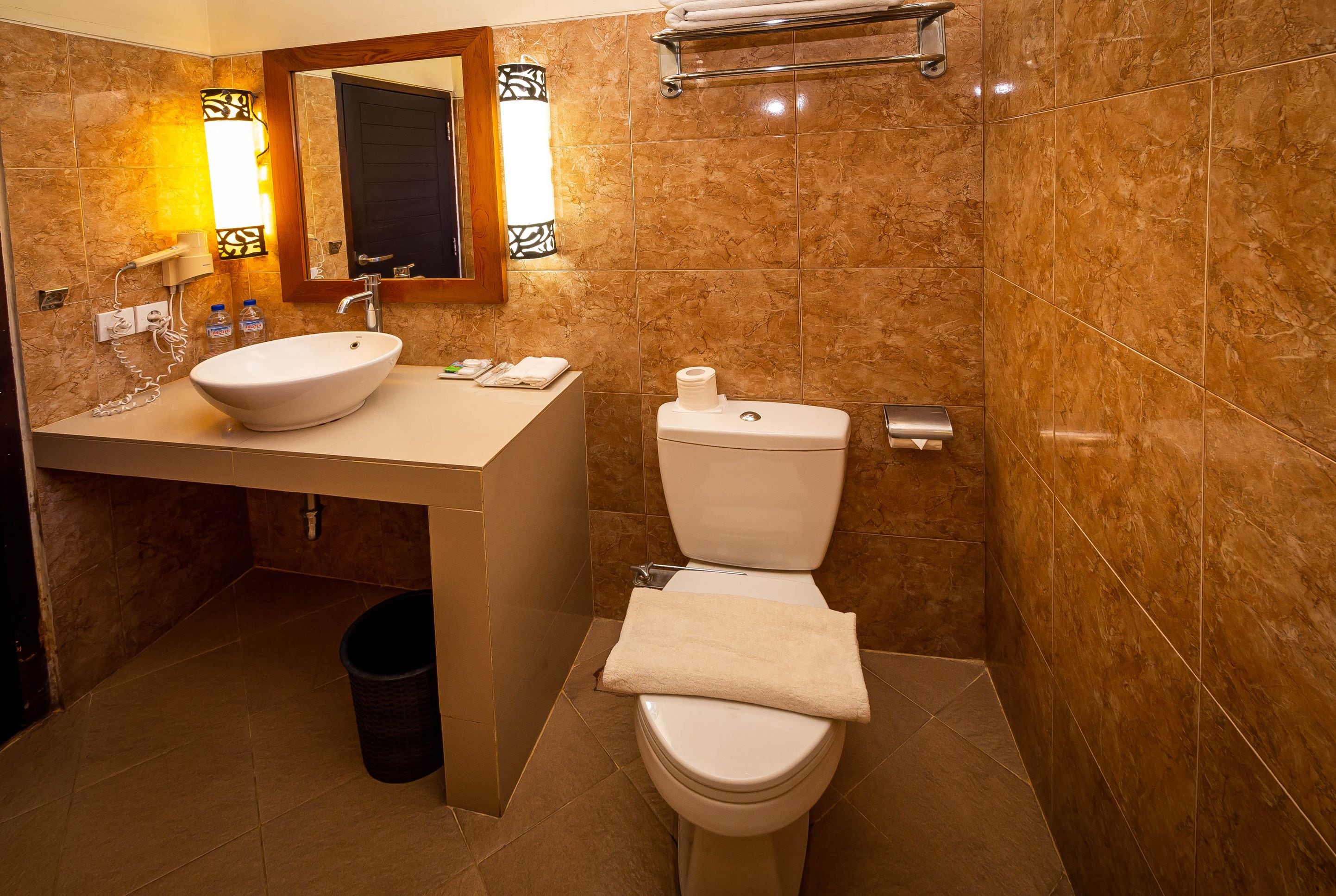 free toiletries, hair dryer, slippers, towels