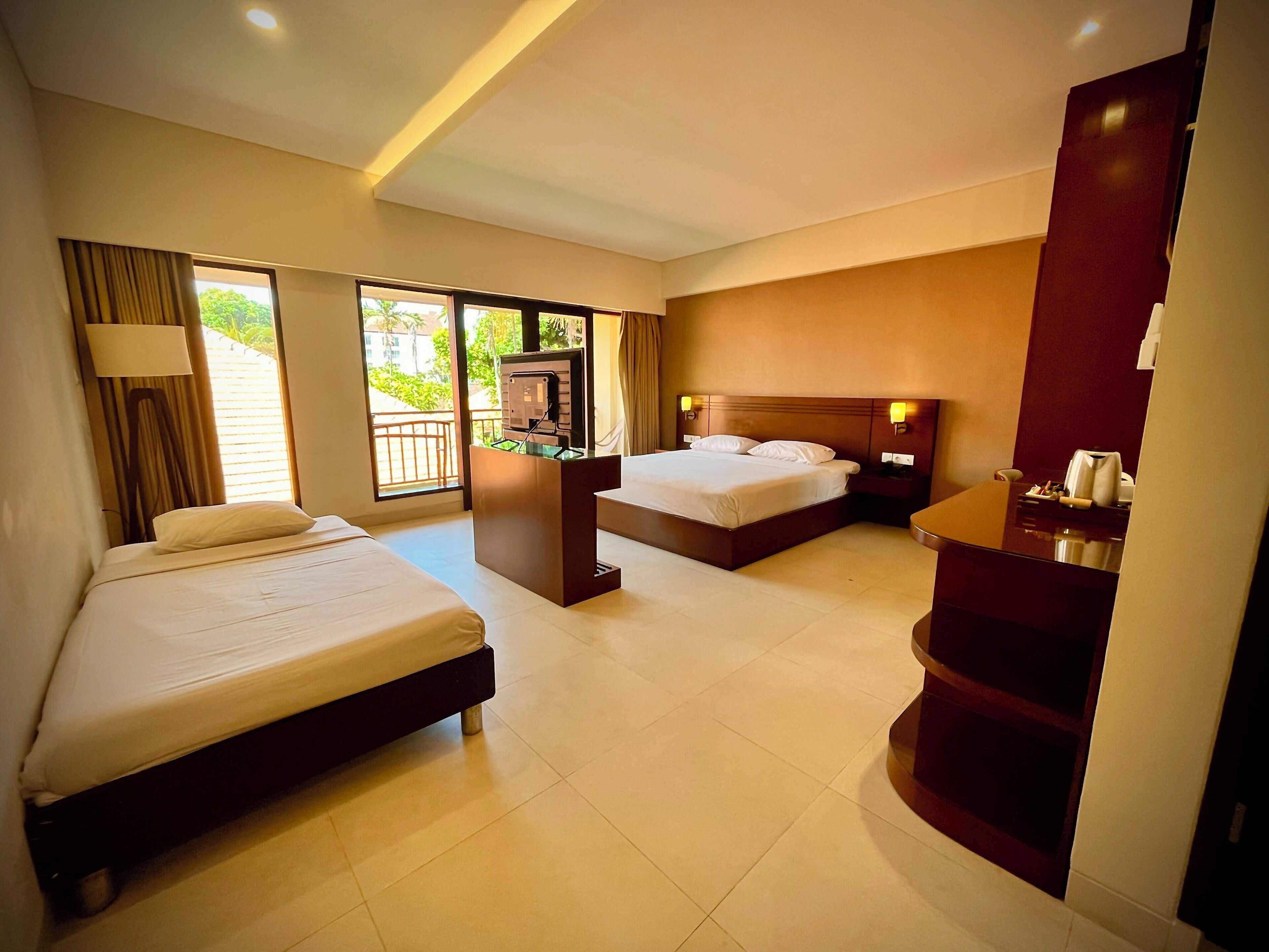 deluxe premier room with triple bed | 1 bedroom, in-room safe, desk, free cots/infant beds