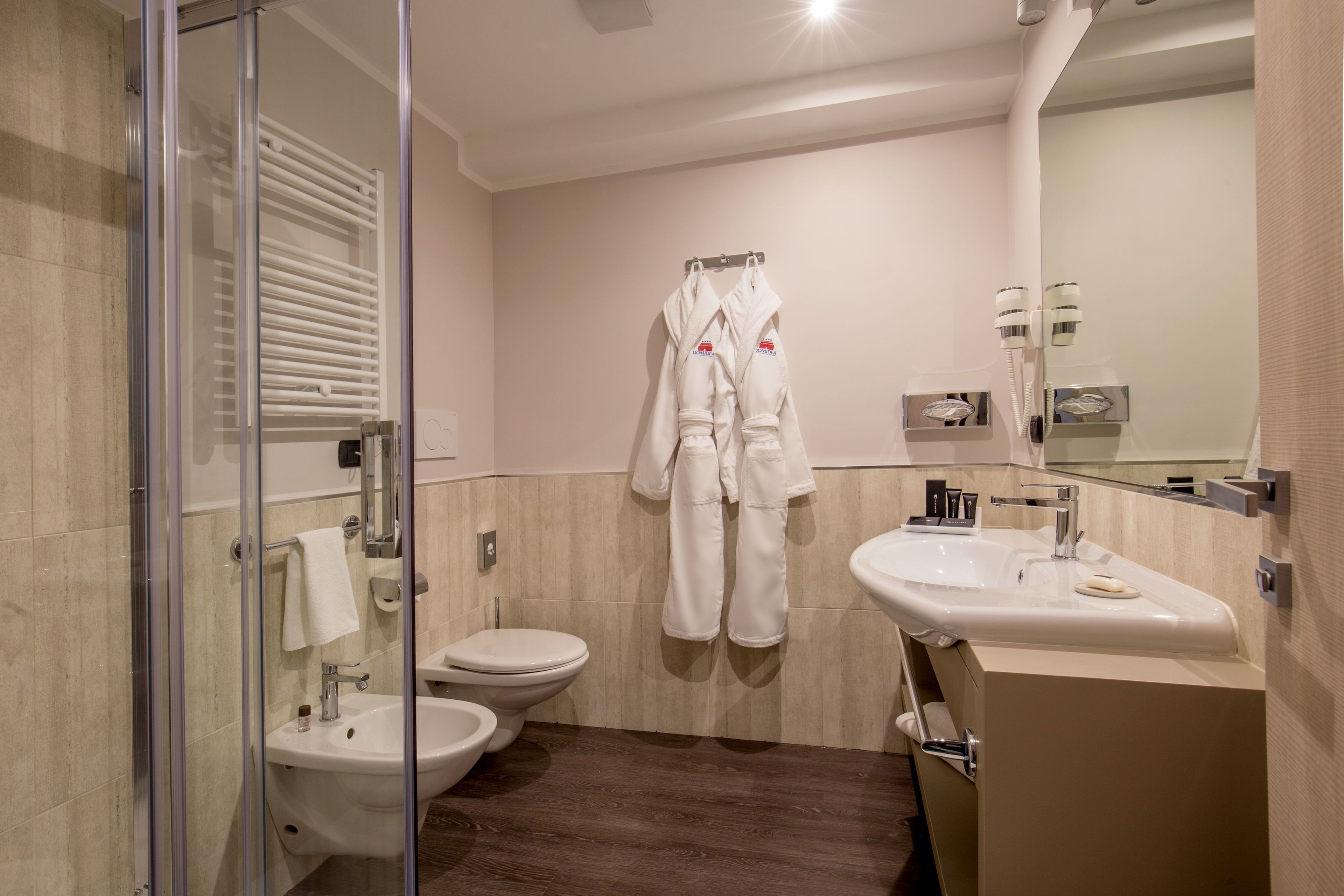 shower, rainfall showerhead, designer toiletries, hair dryer