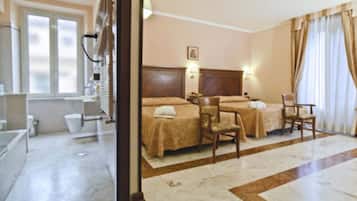 Premium Quadruple Room, City View | Minibar, in-room safe, desk, soundproofing