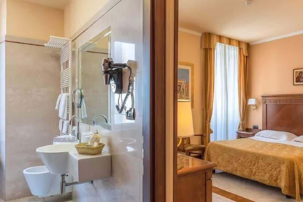 Bathroom | Free toiletries, hair dryer, slippers, bidet
