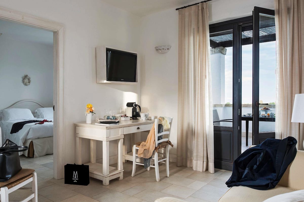 Suite | 1 dormitorio, ropa de cama de alta calidad, minibar y caja fuerte