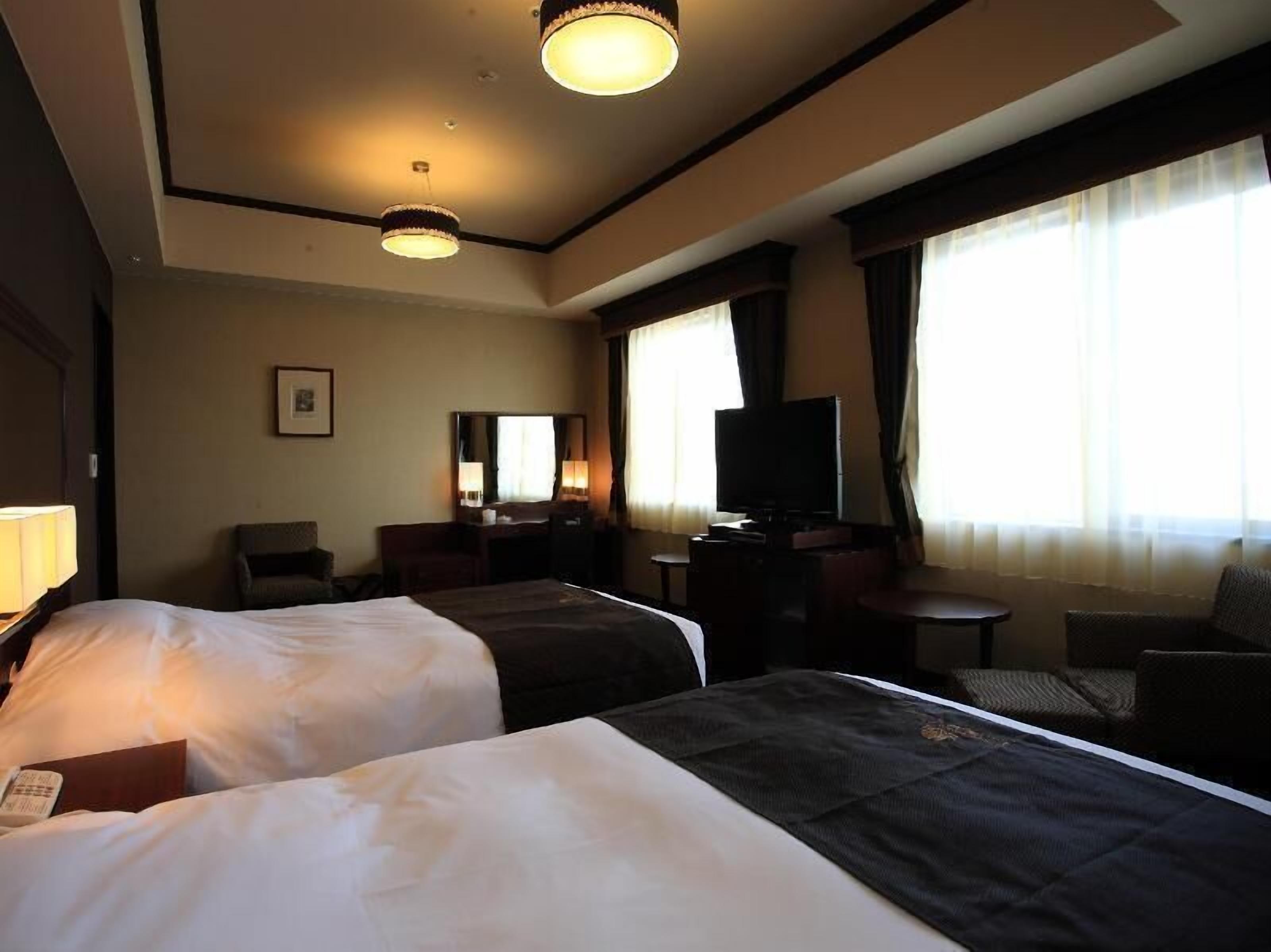 Down comforters, blackout drapes, iron/ironing board, free WiFi