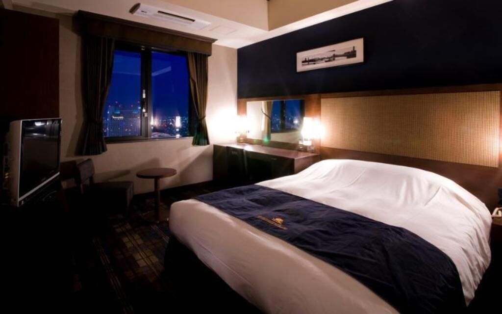 Down comforters, blackout drapes, iron/ironing board, free WiFi