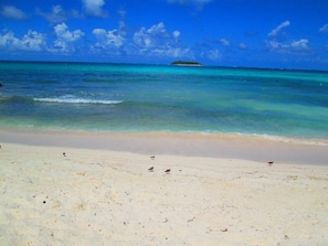 On the beach, white sand, beach towels