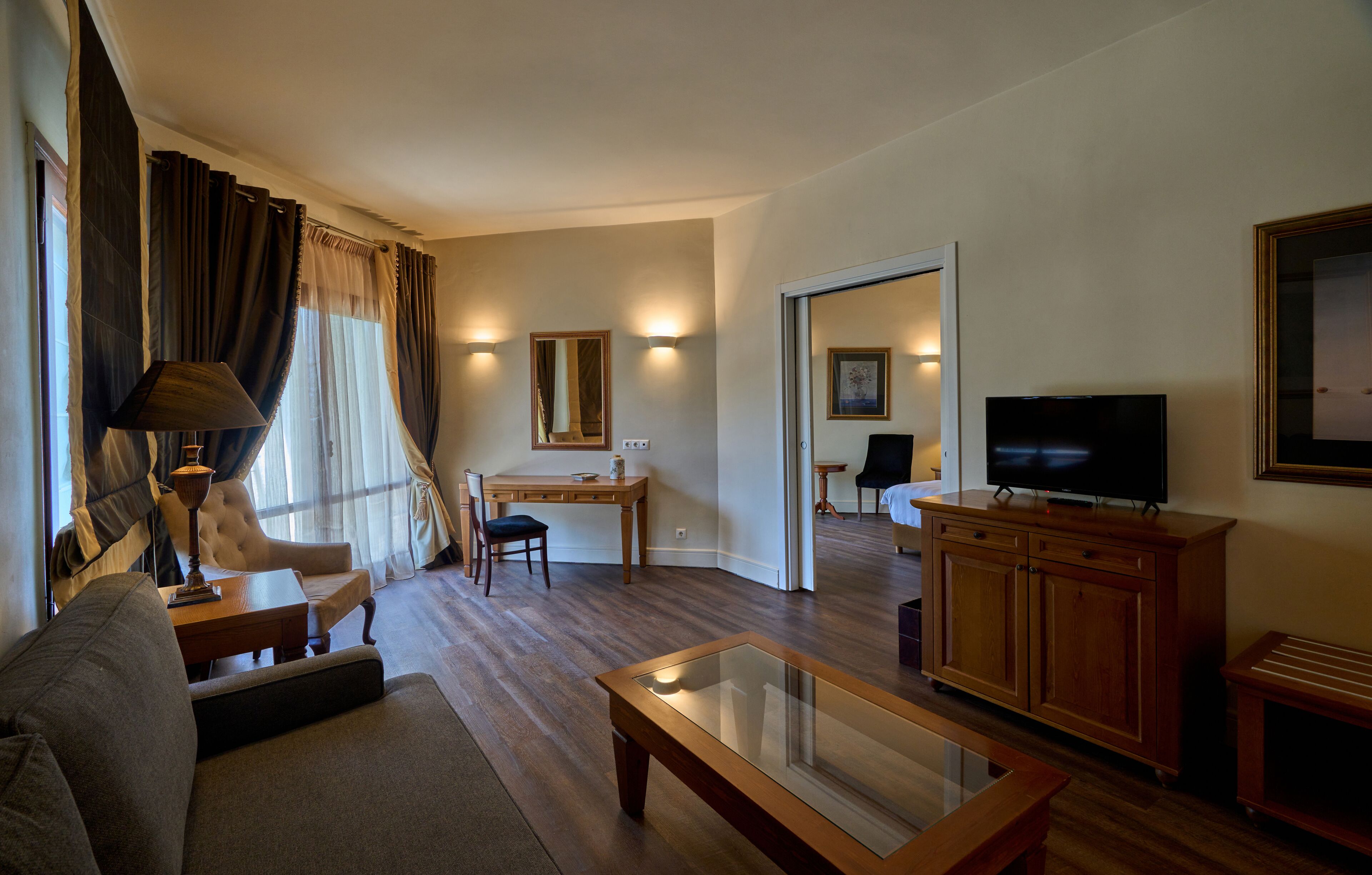 family suite, balcony | minibar, in-room safe, desk, blackout curtains