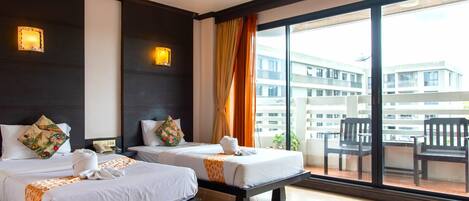 Superior Twin Room | Minibar, in-room safe, desk, laptop workspace