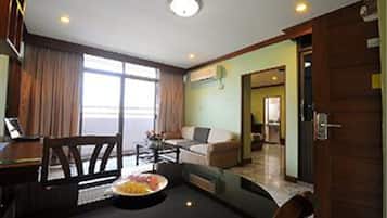 Presidential Suite, 2 Bedrooms | Living room | TV