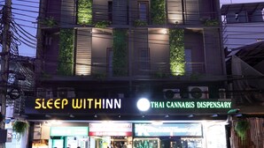 A building with a Thai cannabis dispensary named "Sleep Withinn." - Sleep With Inn (Bangkok)