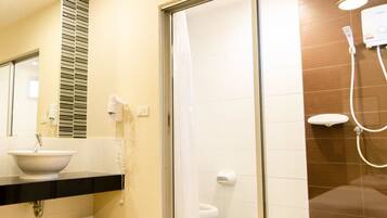 Shower, free toiletries, hair dryer, slippers