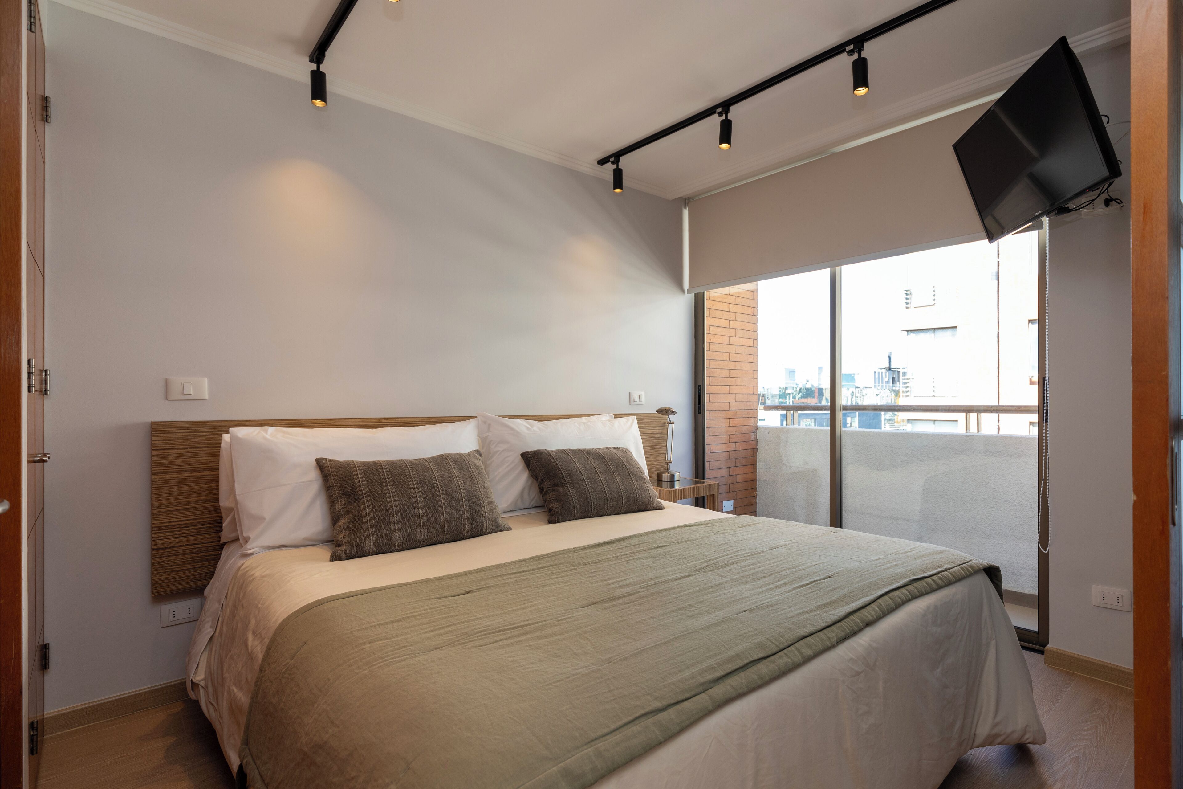 Premium bedding, laptop workspace, free WiFi, bed sheets