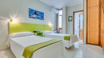 Double Room (Interior) | Minibar, blackout curtains, free cots/infant beds, free WiFi