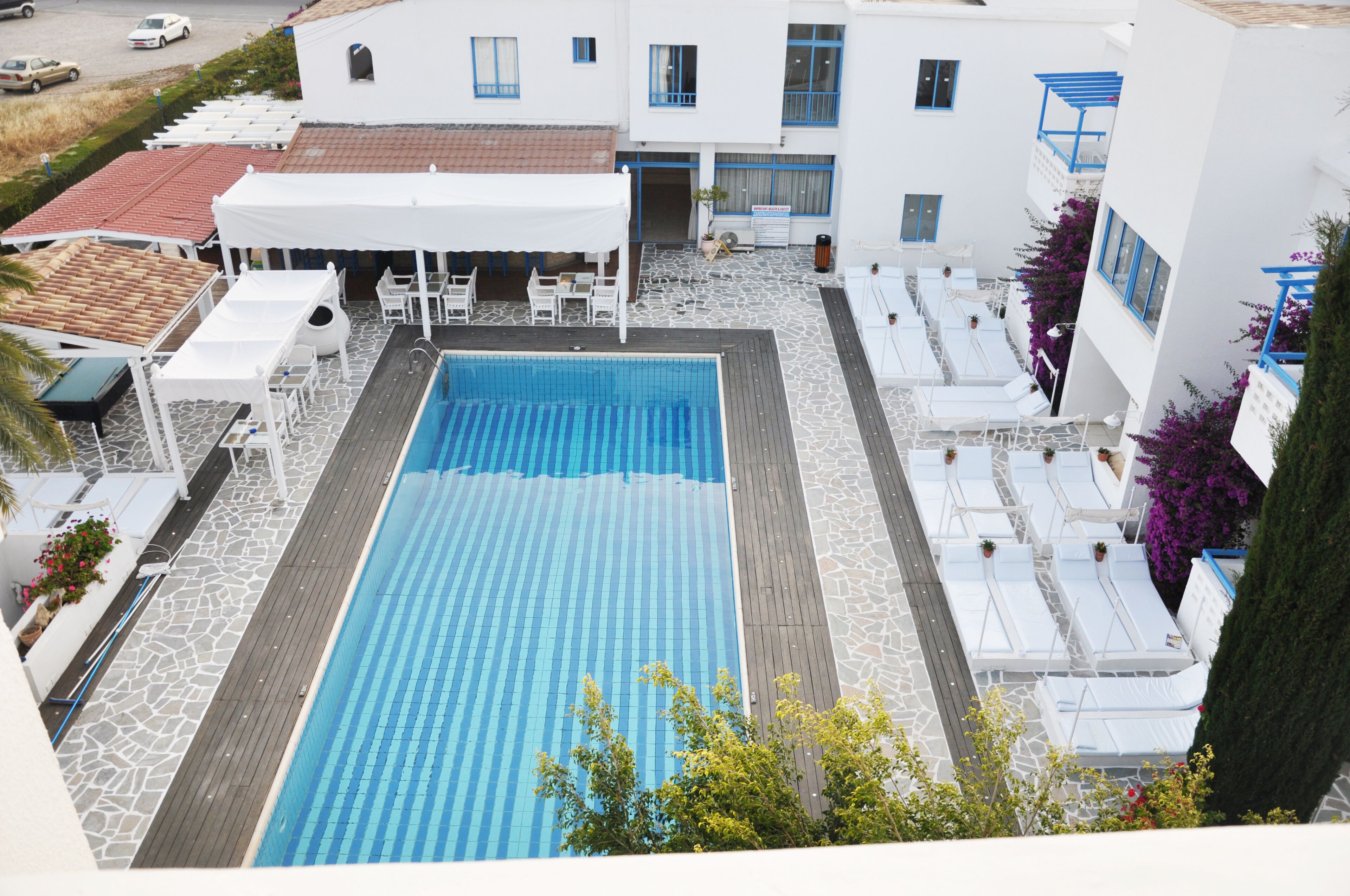 Outdoor pool, pool umbrellas, pool loungers