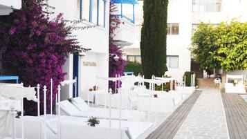 Outdoor pool, pool umbrellas, pool loungers